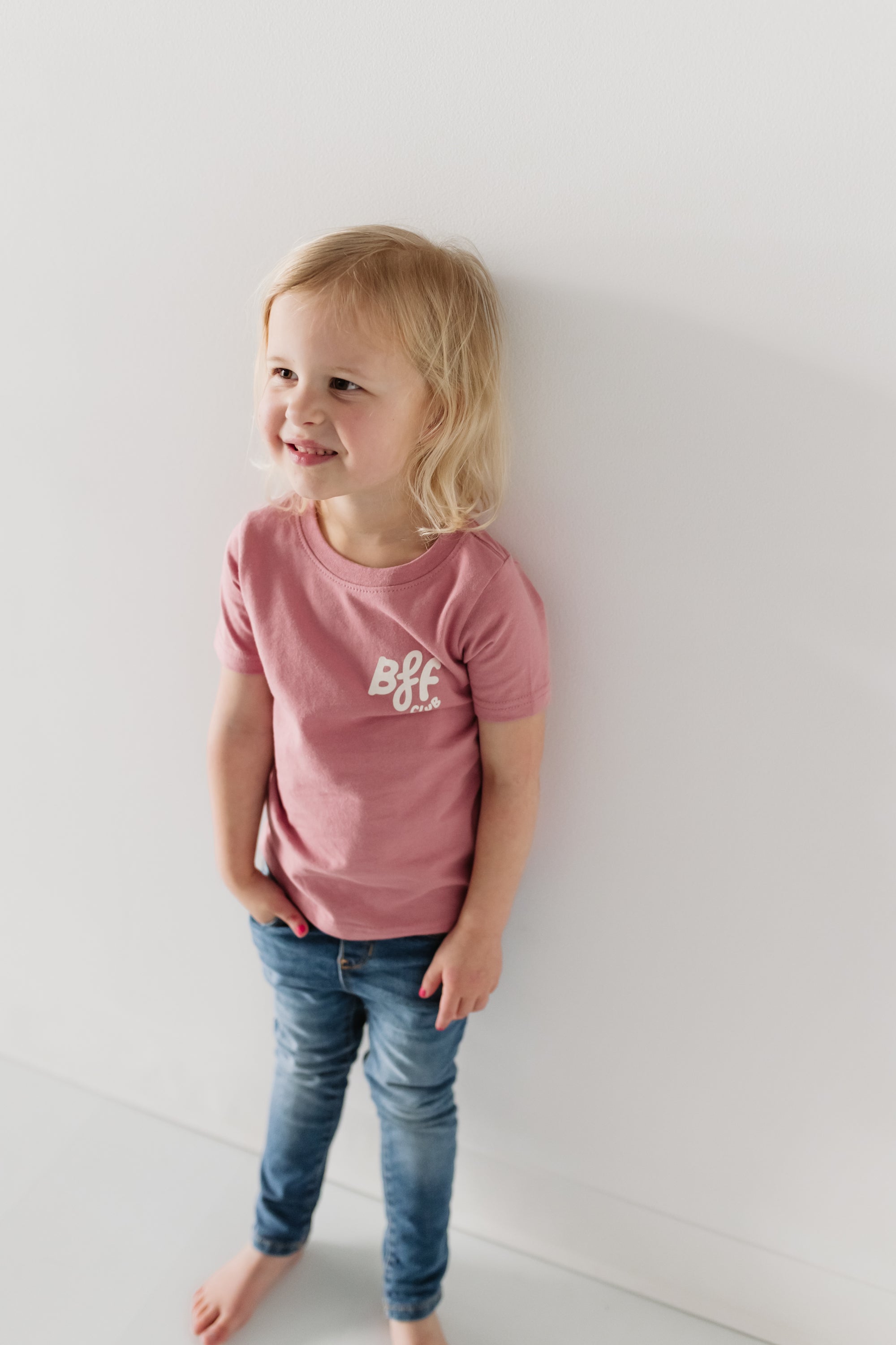toddler girl wearing mauve bff club t-shirt smiling