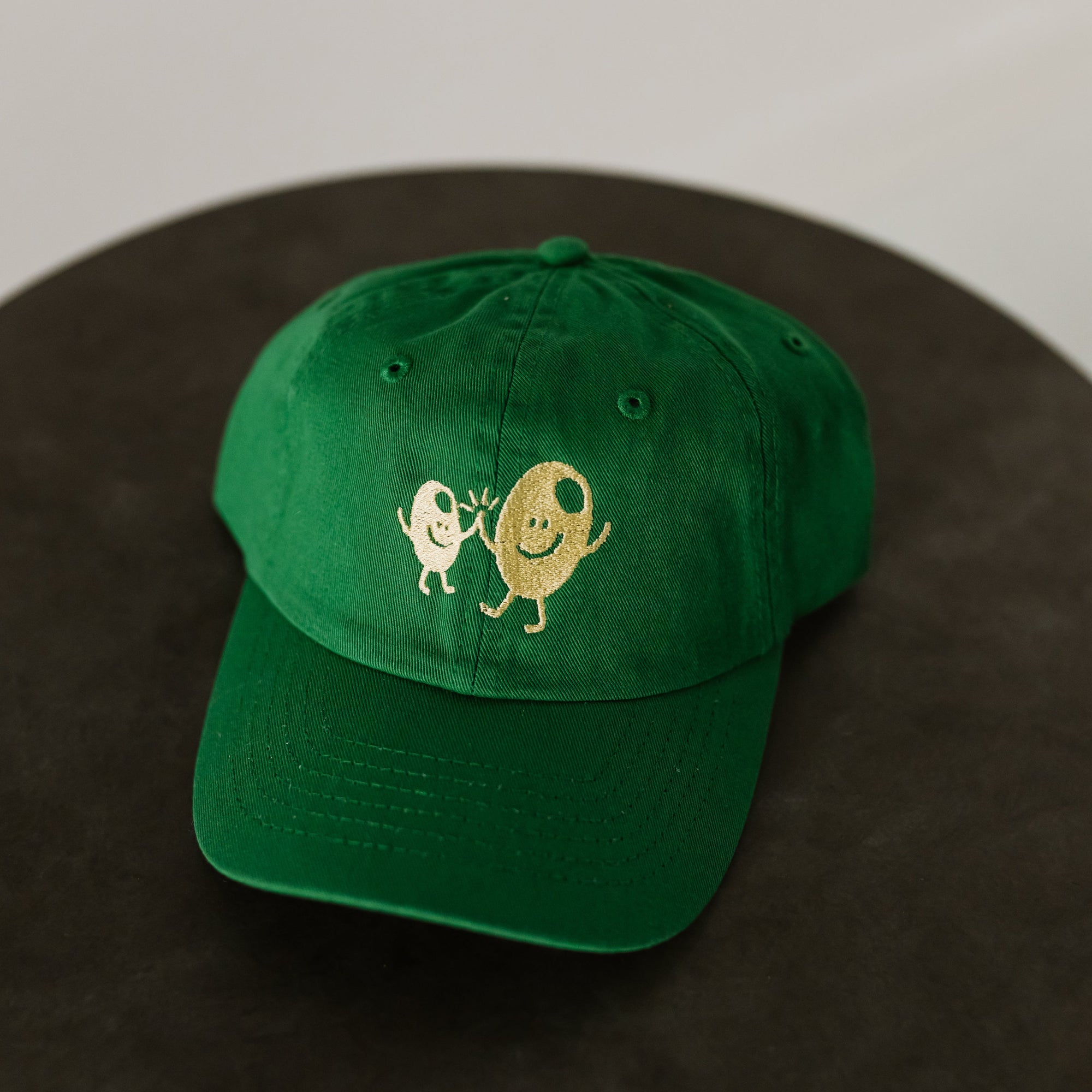 green toddler baseball cap with olive bff icon in light green