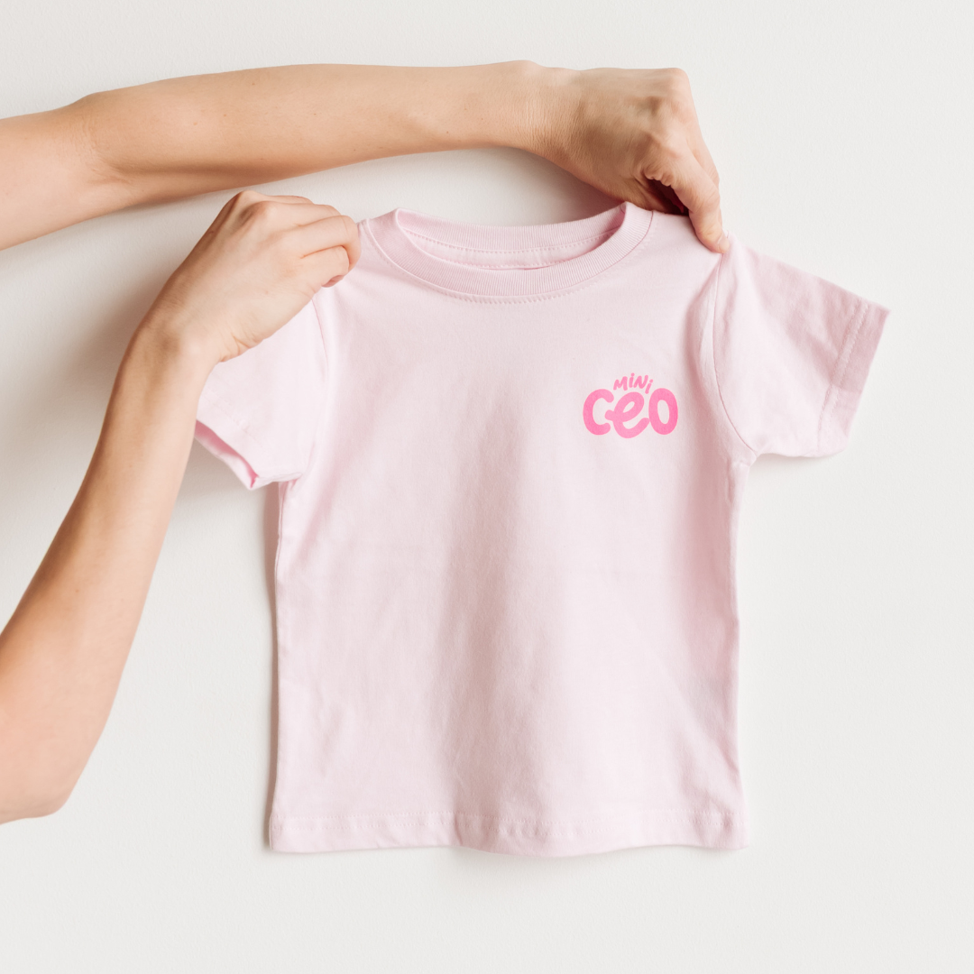 light pink toddler short-sleeve t-shirt with mini ceo screenprinted in bright pink